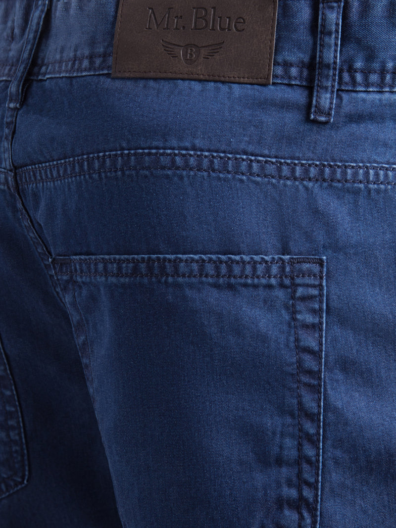 Calças de ganga cintura subida azul denim em tencel e algodão
